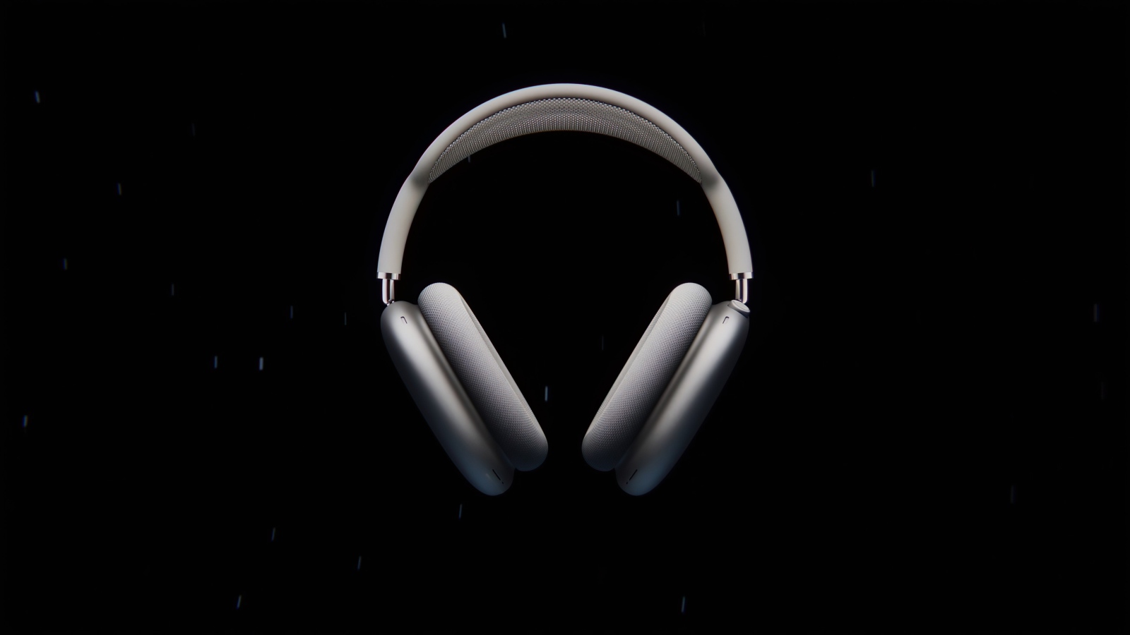 Gray AirPods Max headphones on black background