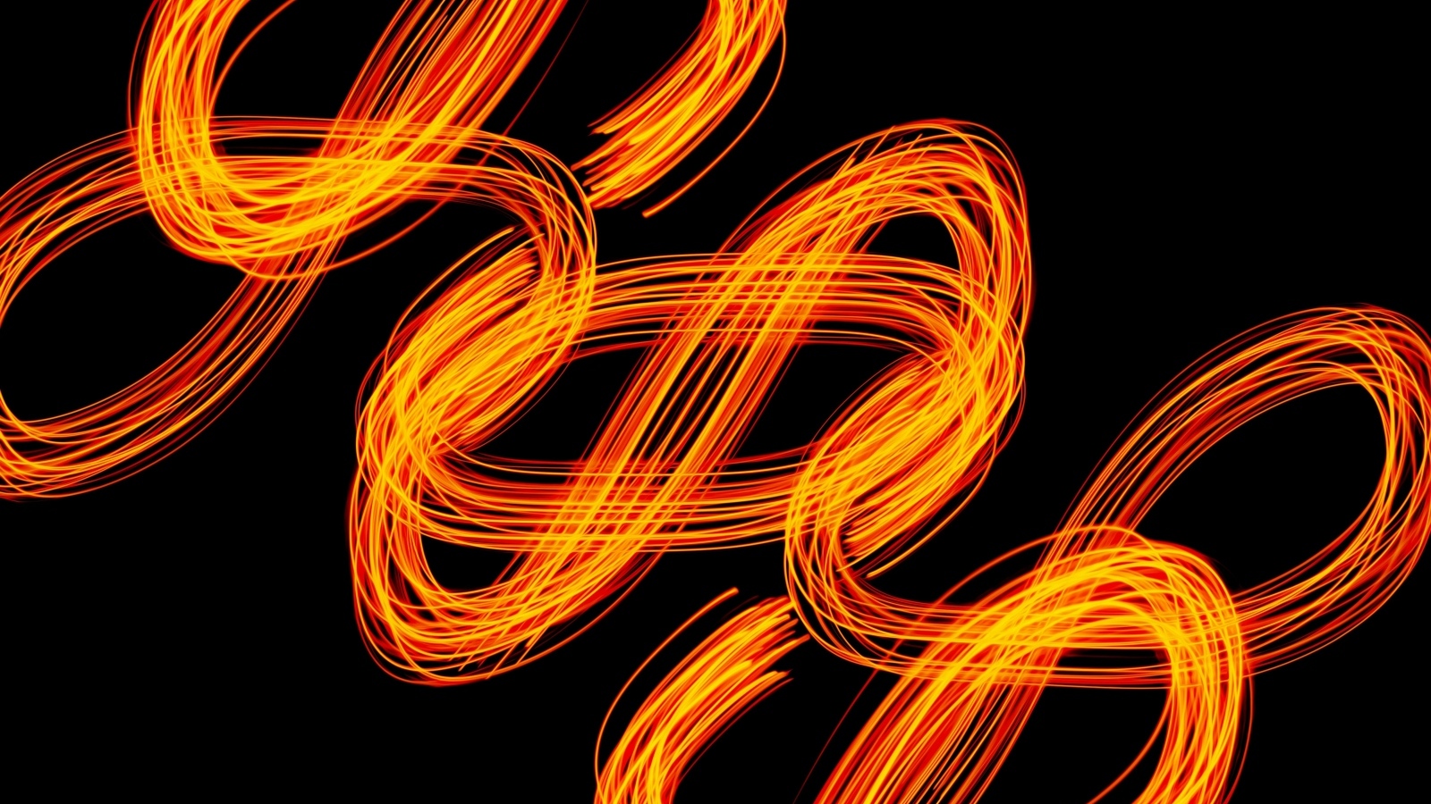 Огненные завитки на черном фоне