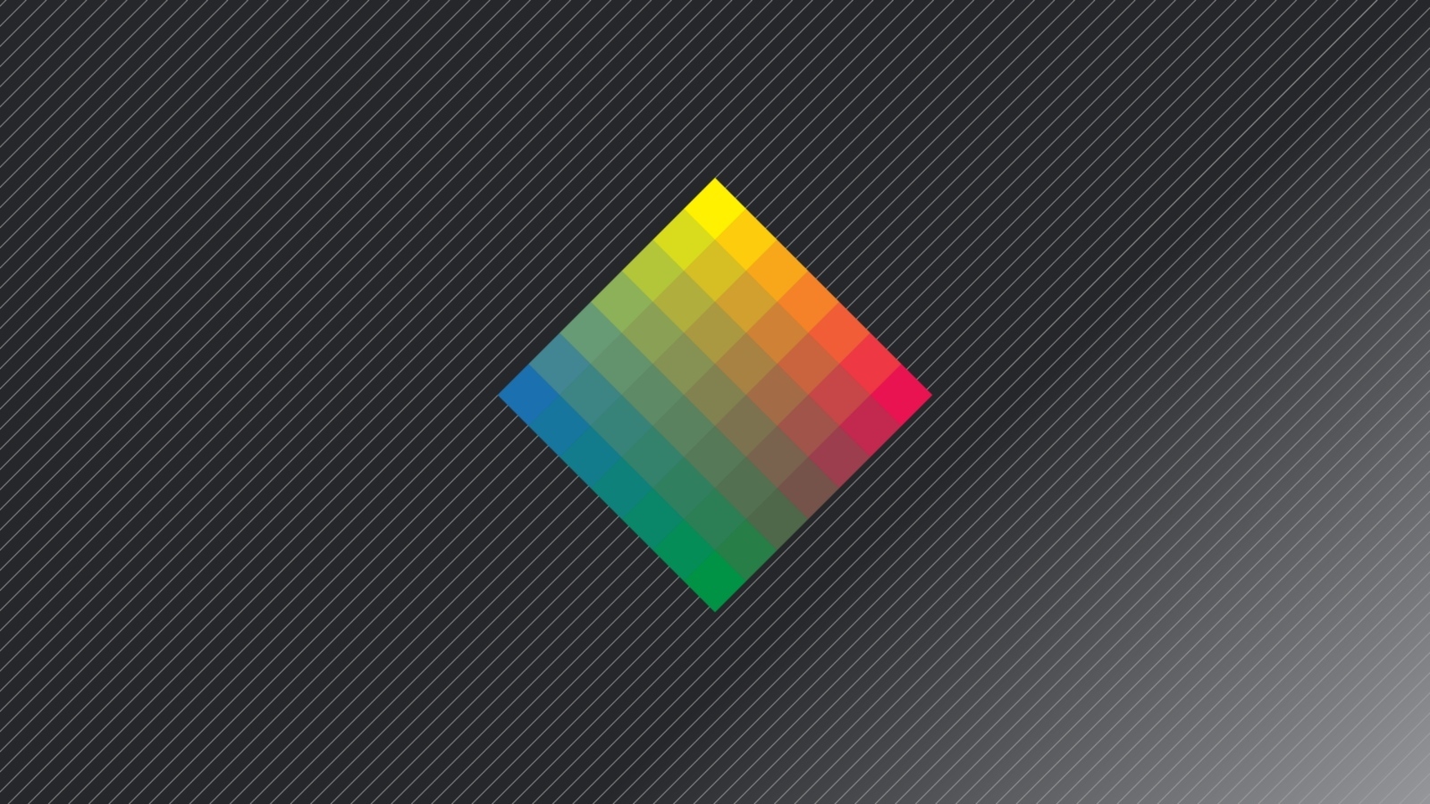 Разноцветный ромб на сером фоне