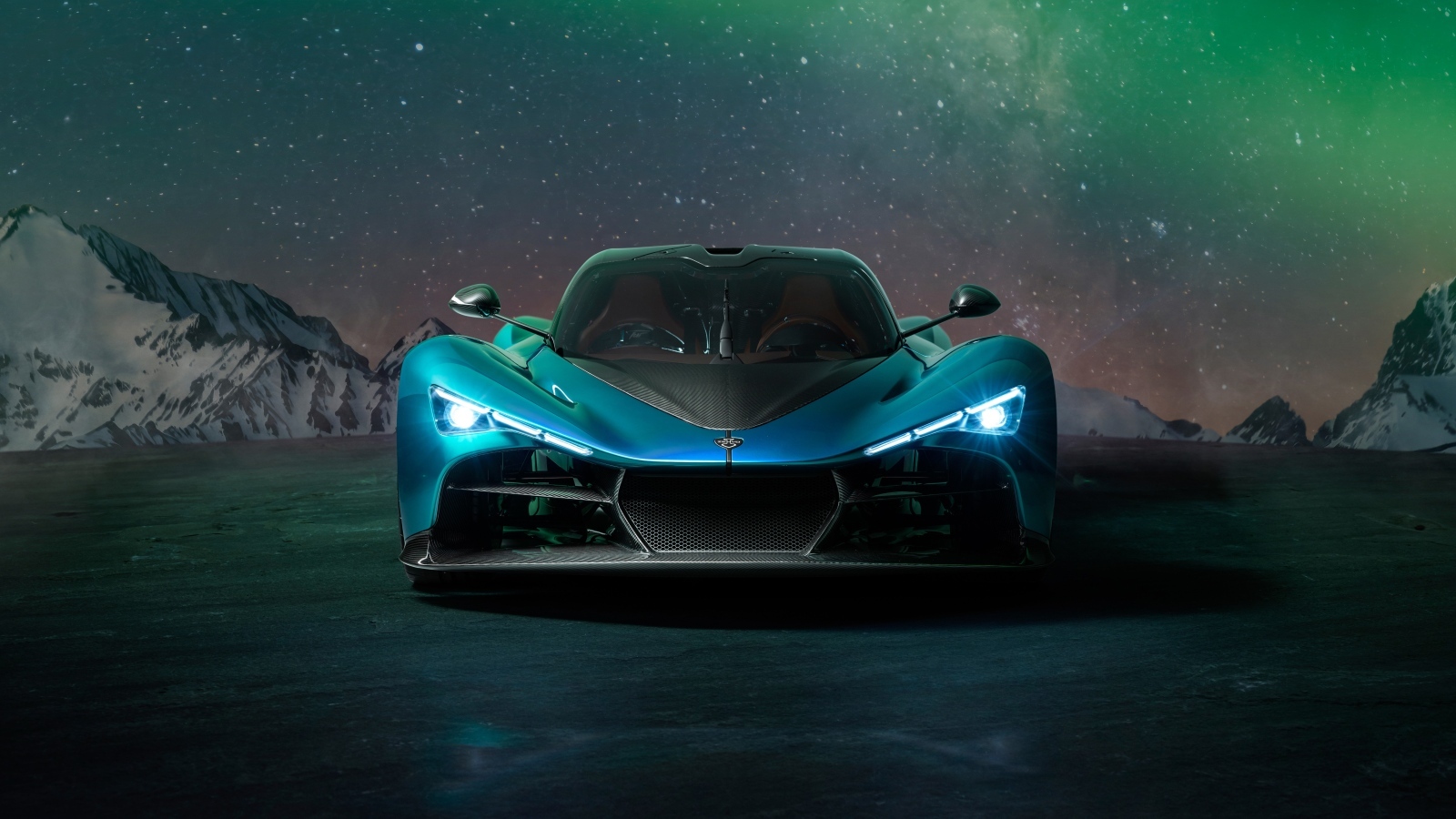 Вид спереди на дорогой автомобиль Zenvo Aurora Agil  ночью