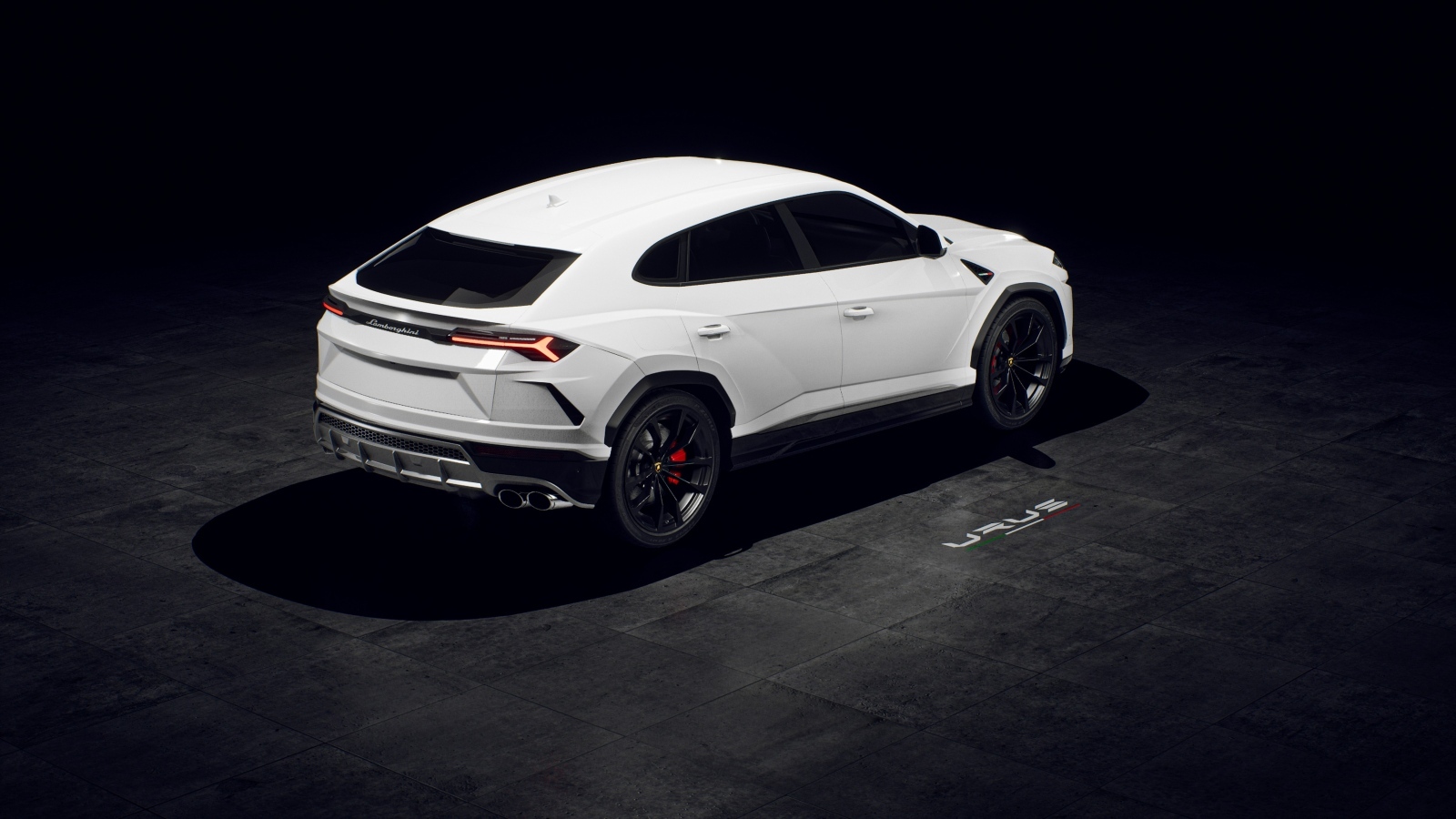 Белый внедорожник Lamborghini Urus вид сзади