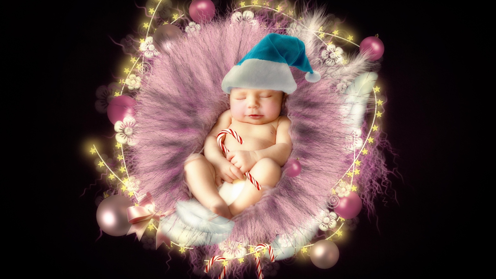 Красивый новорожденный ребенок в колыбели на черном фоне