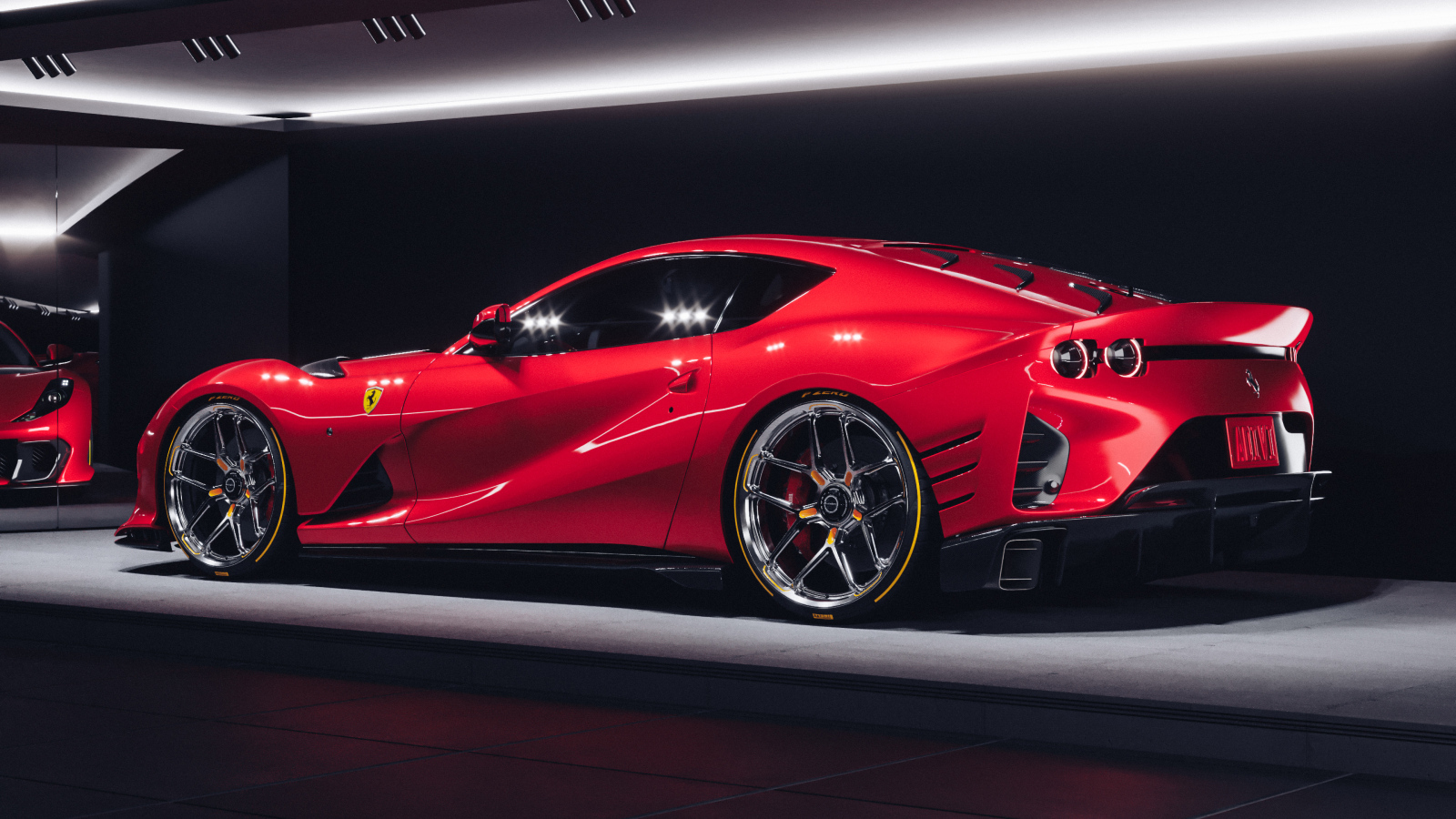 Красный быстрый автомобиль Ferrari 812 Competizione вид сзади