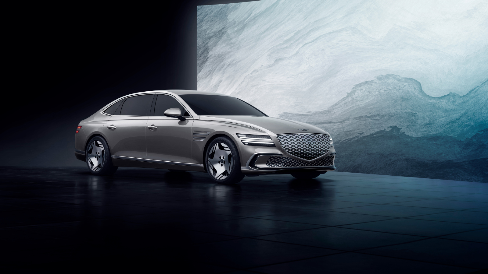 Серый автомобиль Genesis Electrified G80 2024 года