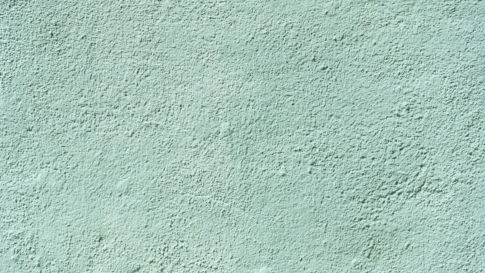 Текстура стены цвета мята для фона