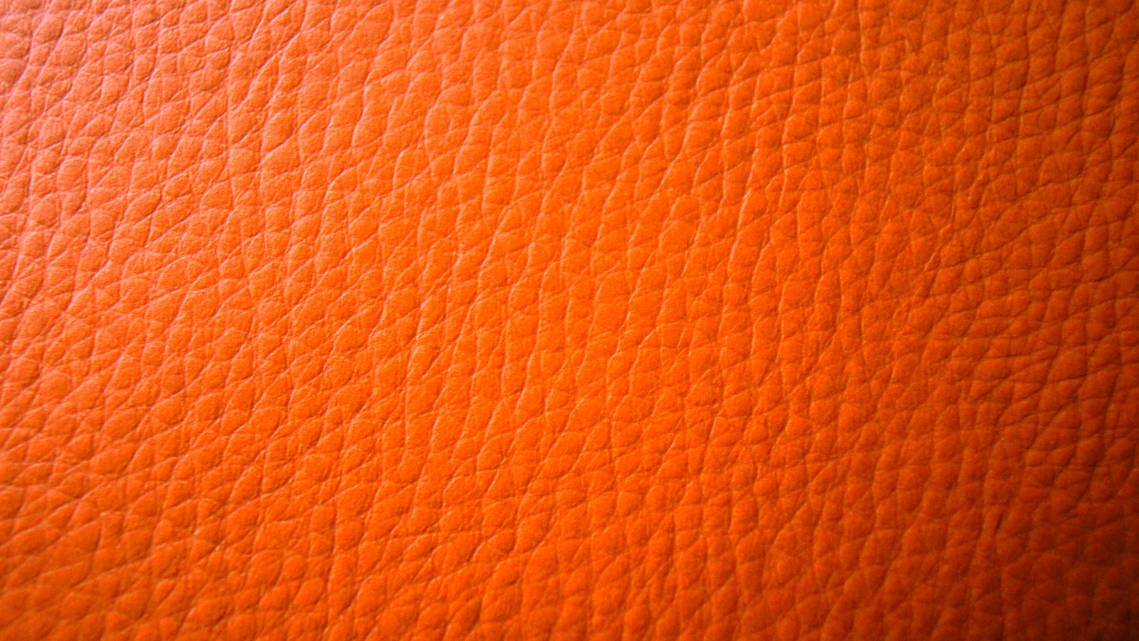 Оранжевый кожаный фон 