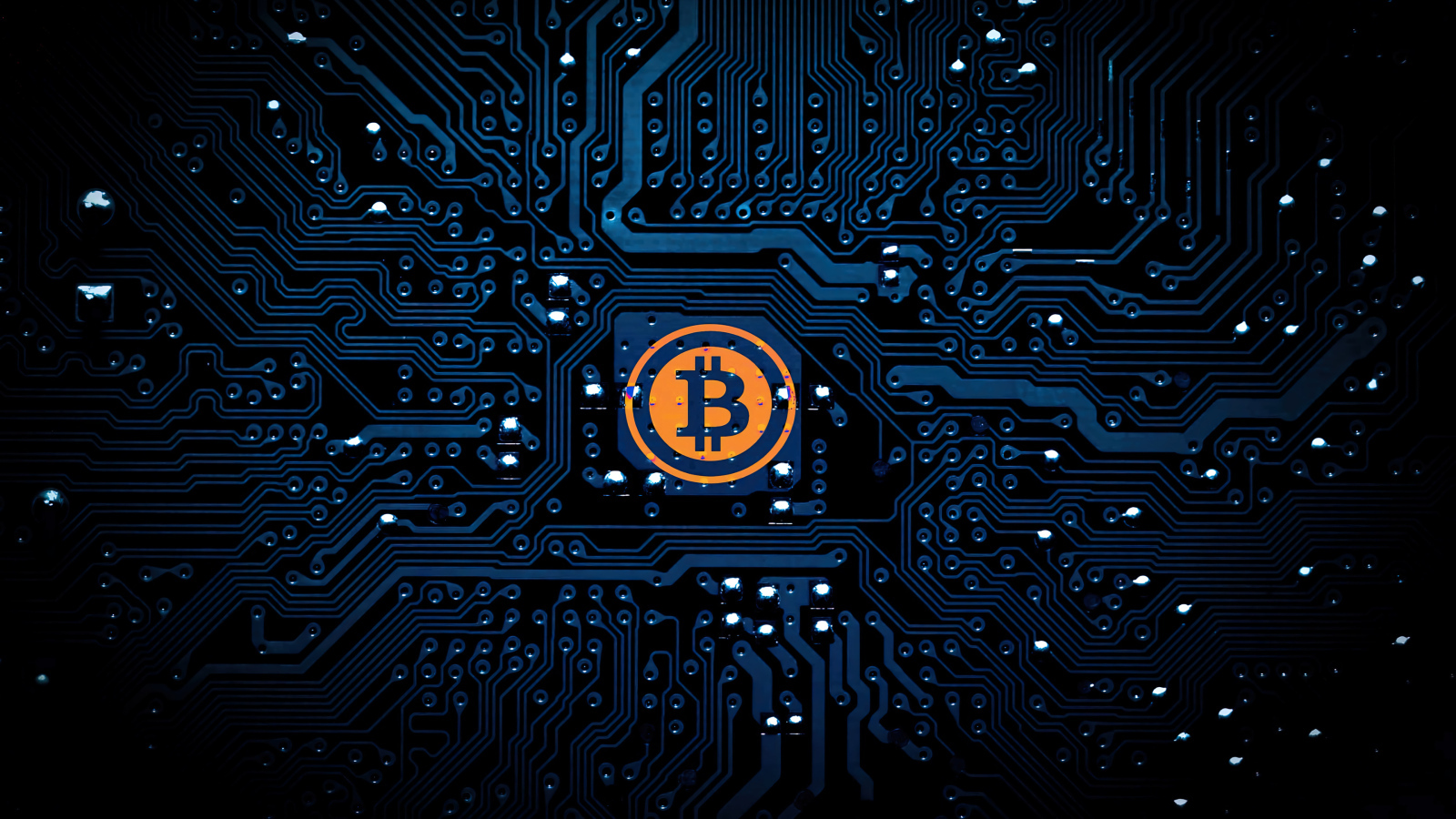 Яркий логотип биткоин на плате