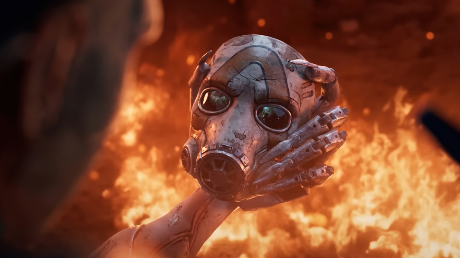 Маска в руках на фоне огня в видеоигре Borderlands 4