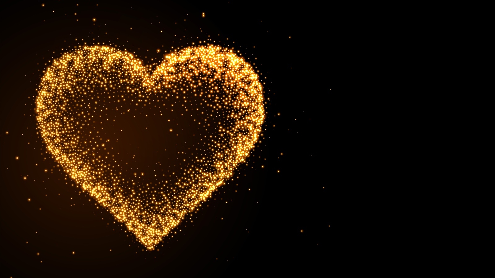 Яркое золотое сердце на черном фоне