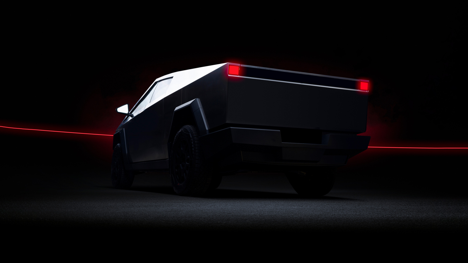 Вид сзади на автомобиль Tesla Cybertruck Dark