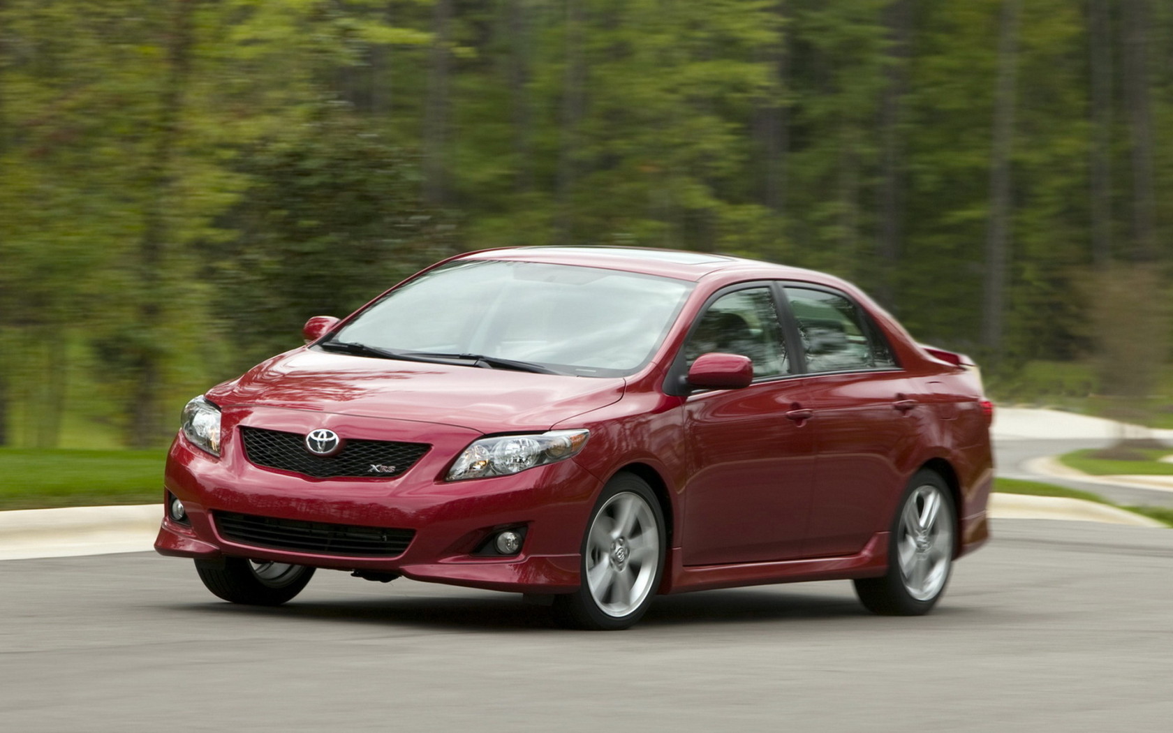 Тойота Королла в движении