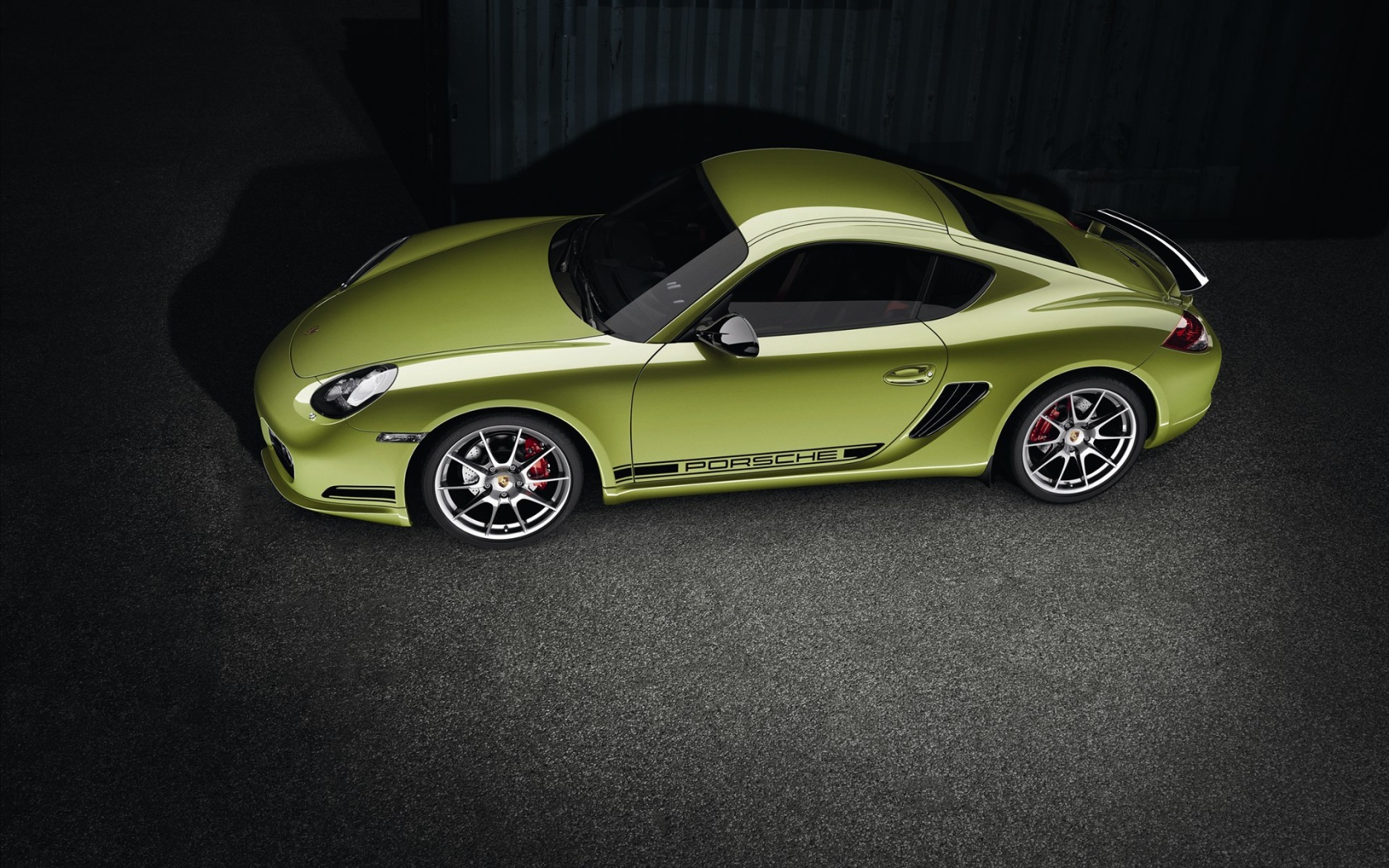 Зеленый Porsche cayman
