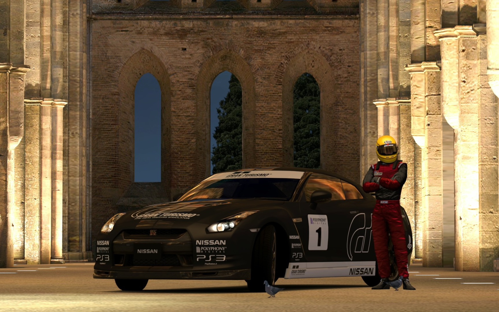 Гонщик у своей машины