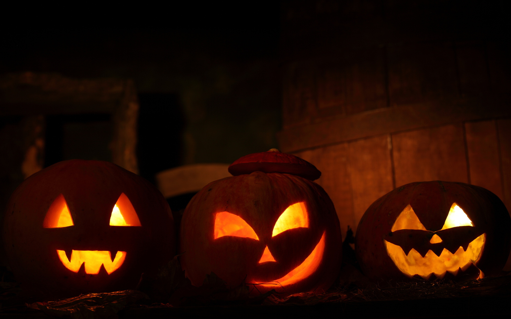 Три тыквы со свечами