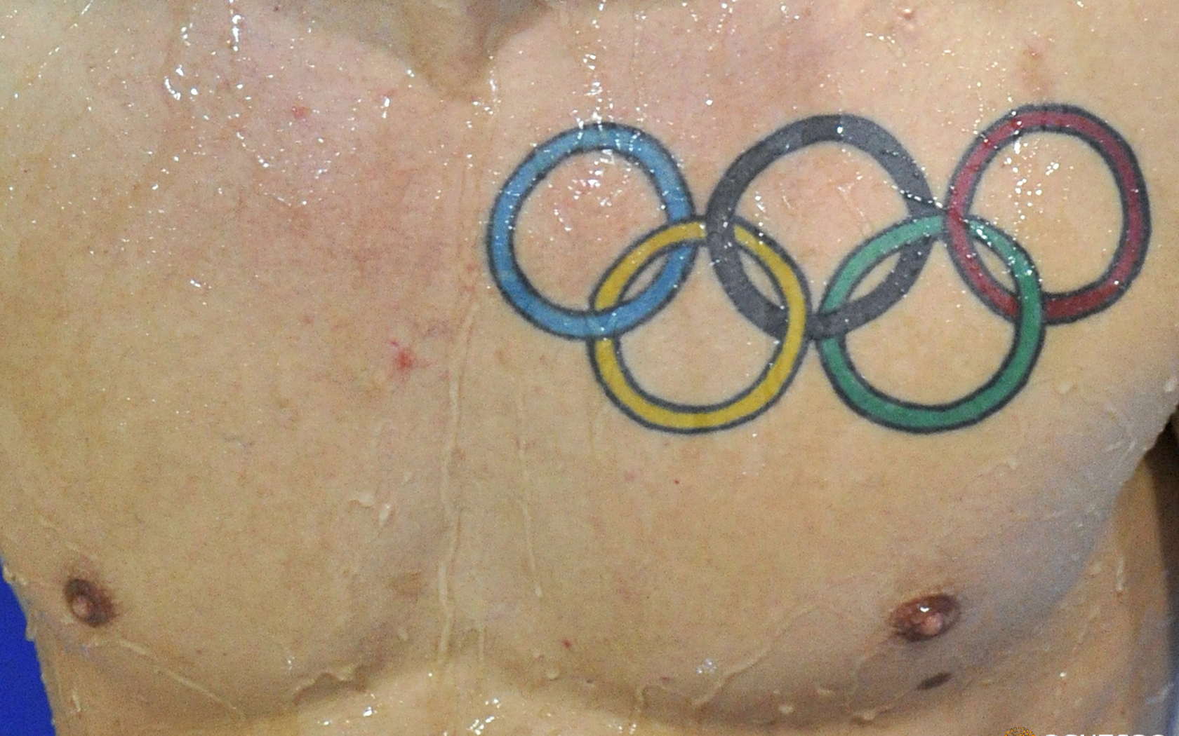 Олимпийские кольца татуировка