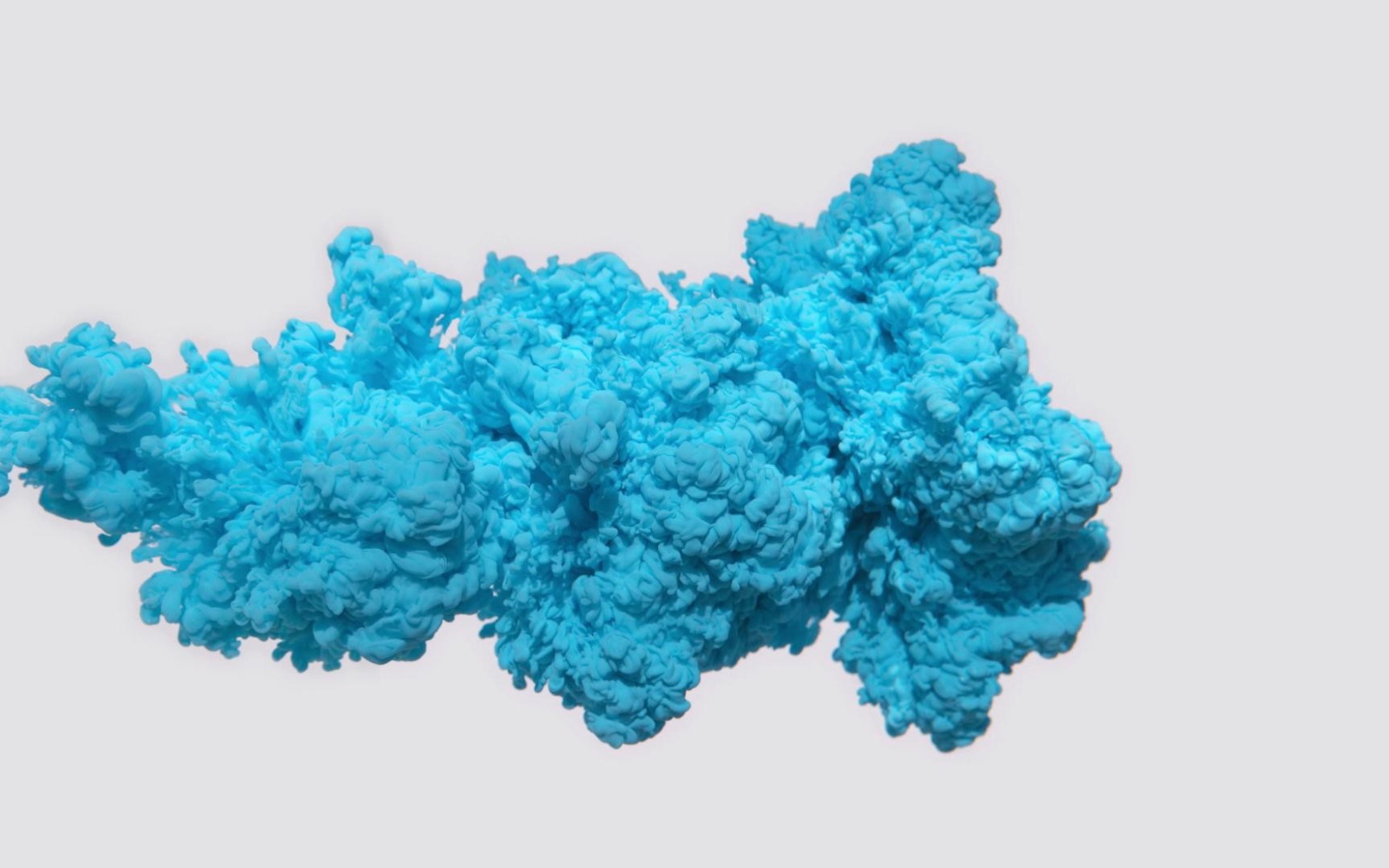 Сгусток голубого дыма на сером фоне