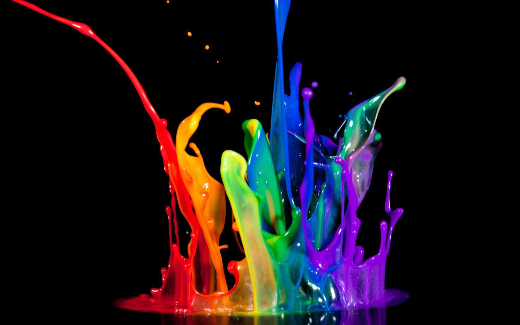 Всплески краски на черном фоне, искусство