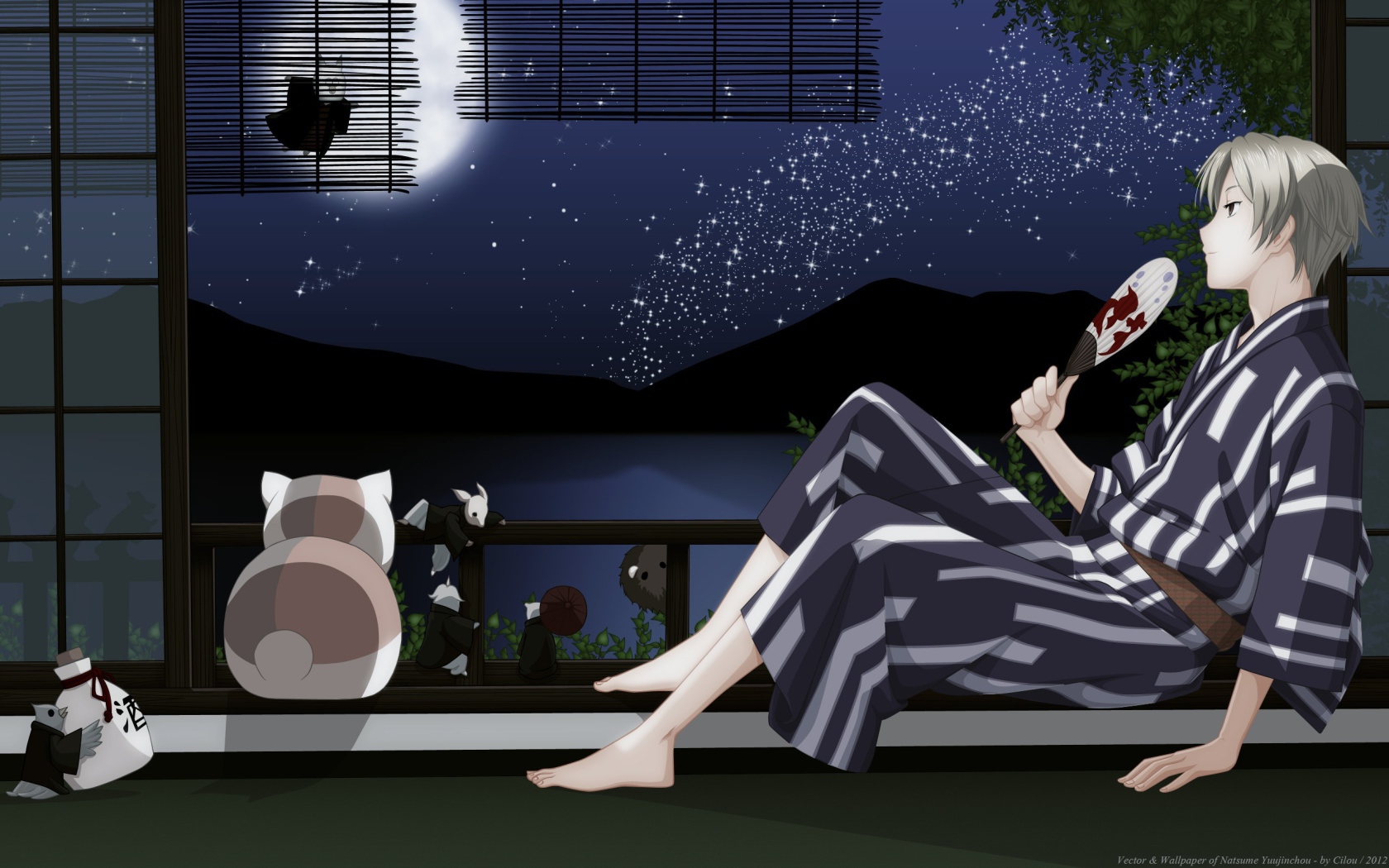 Парень и кот смотрят на луну