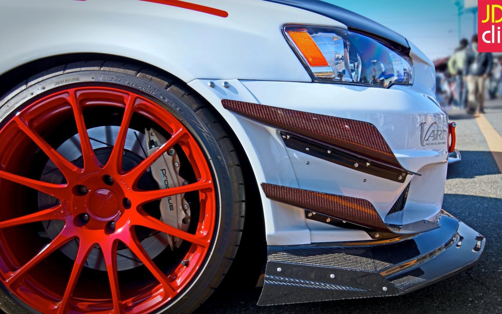 Оранжевый диск автомобиля Mitsubishi Lancer Evo X
