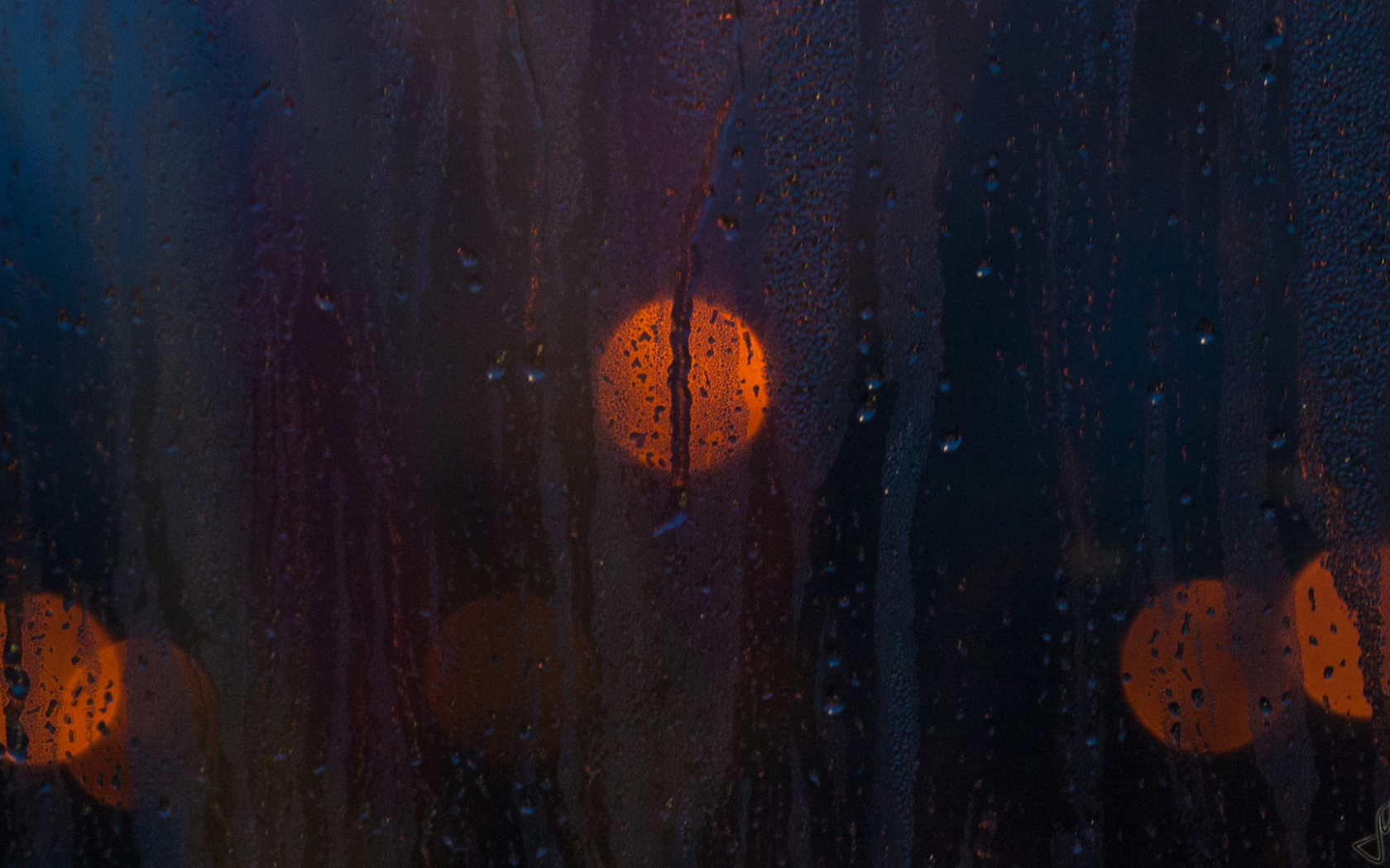 Огни за влажным стеклом