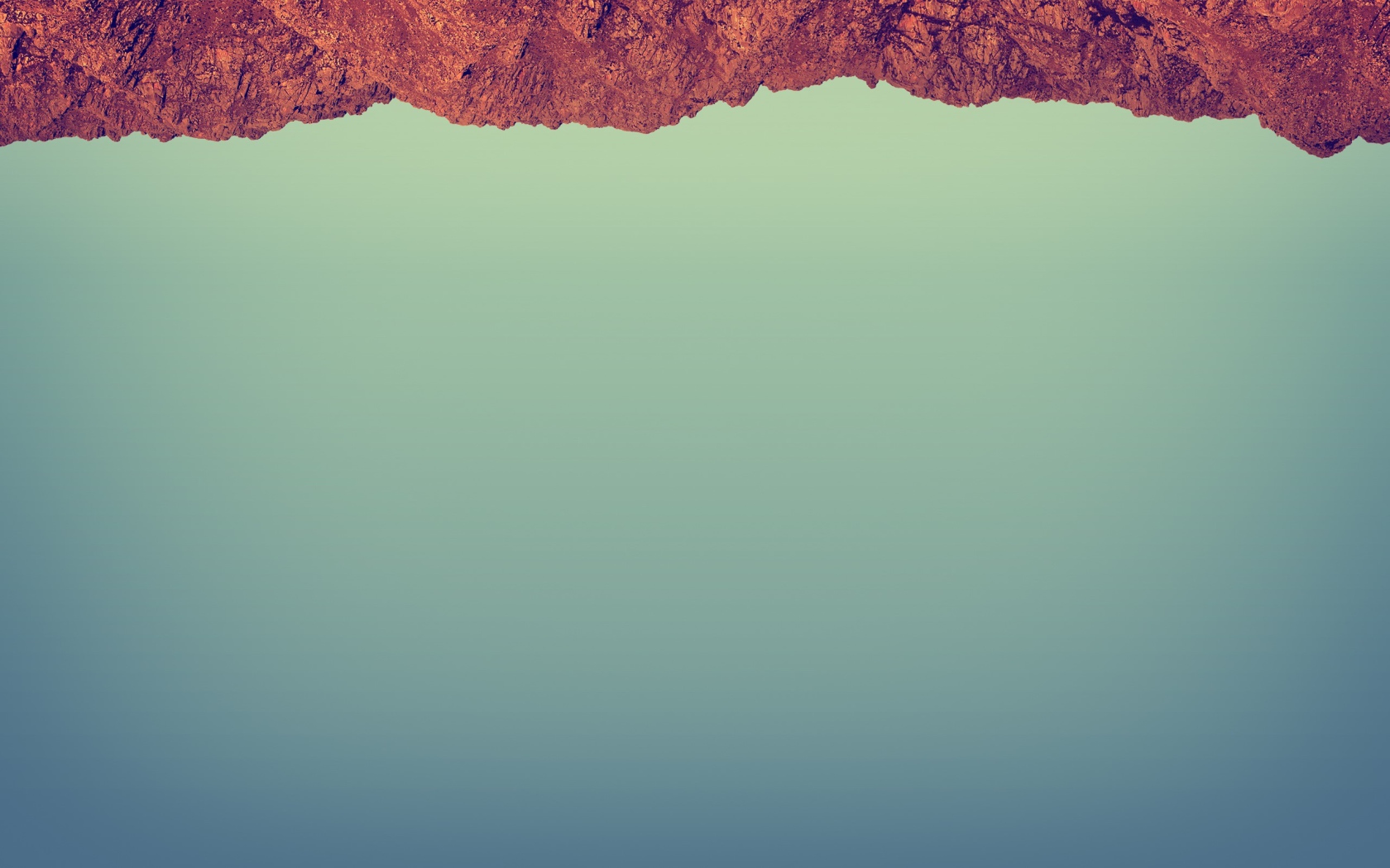 Красный камень на сером фоне