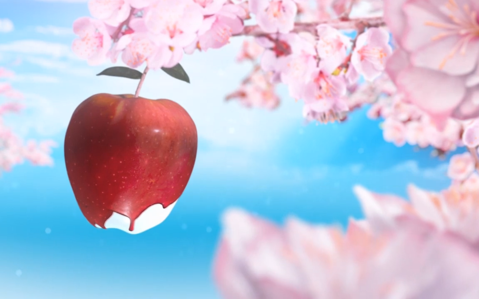 Красное яблоко среди розовых цветов