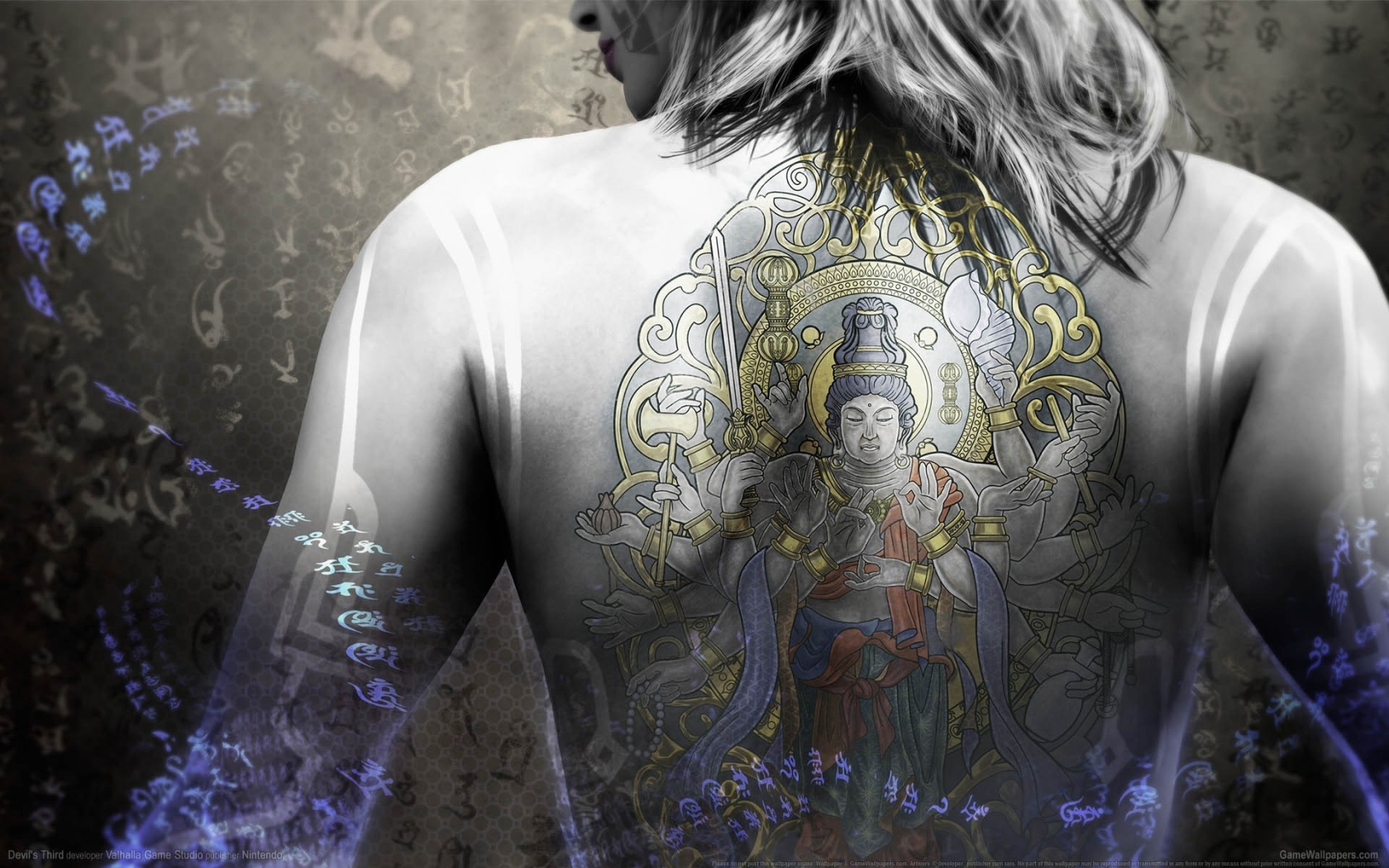Татуировка Будды на спине у девушки