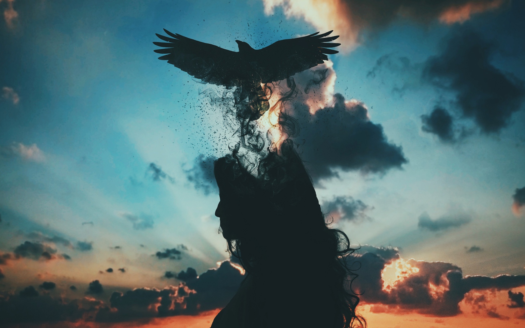 Черная птица вылетает из головы девушки