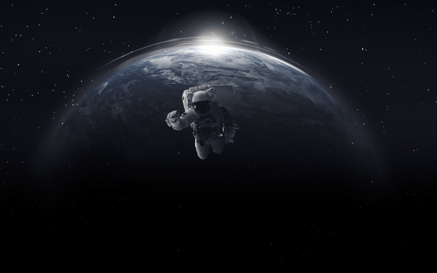 Астронавт в открытом космосе на фоне планеты земля 