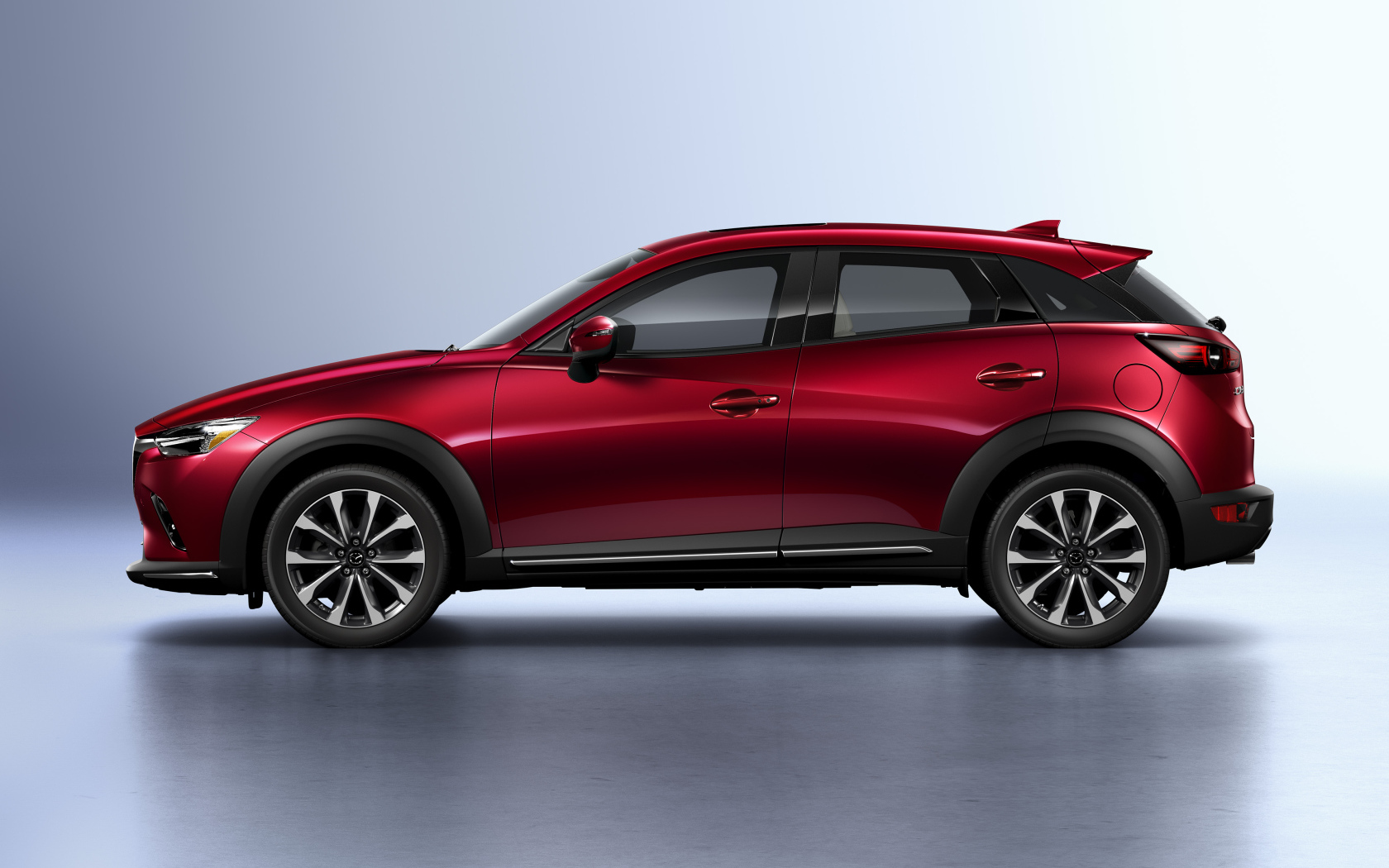 Внедорожник Mazda CX-3, 2019 года вид сбоку