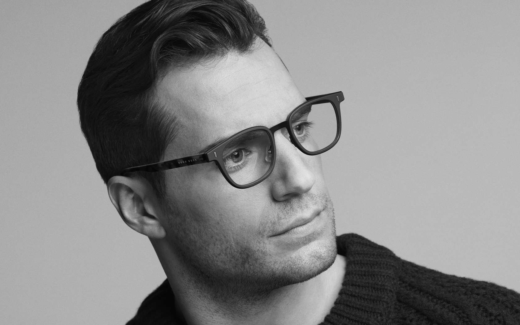 Actor Henry Cavill in glasses black and white photo