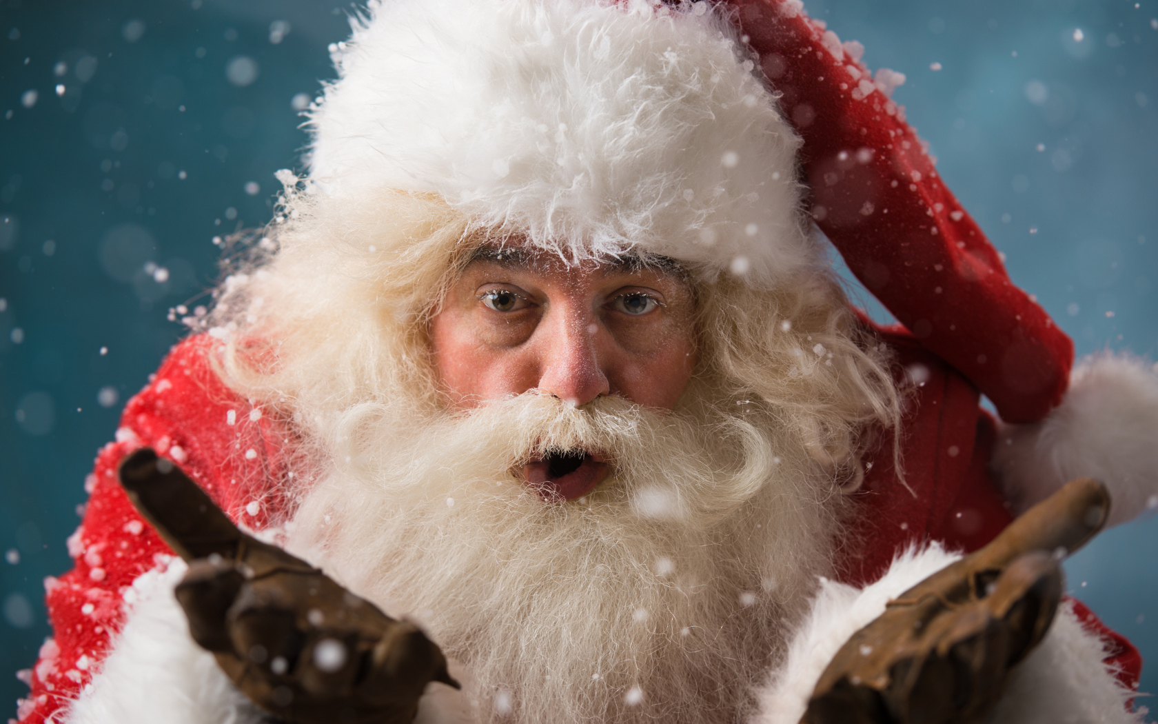 Bearded Santa Claus in a red suit for the New Year and Christmas