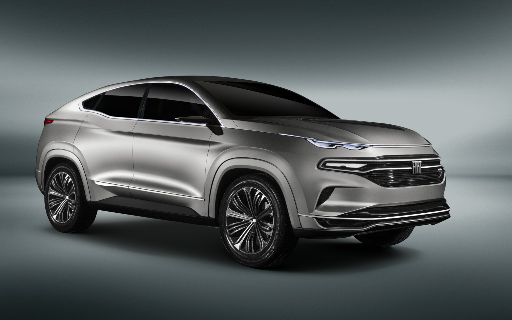 Внедорожник Fiat Fastback, 2018 года на сером фоне