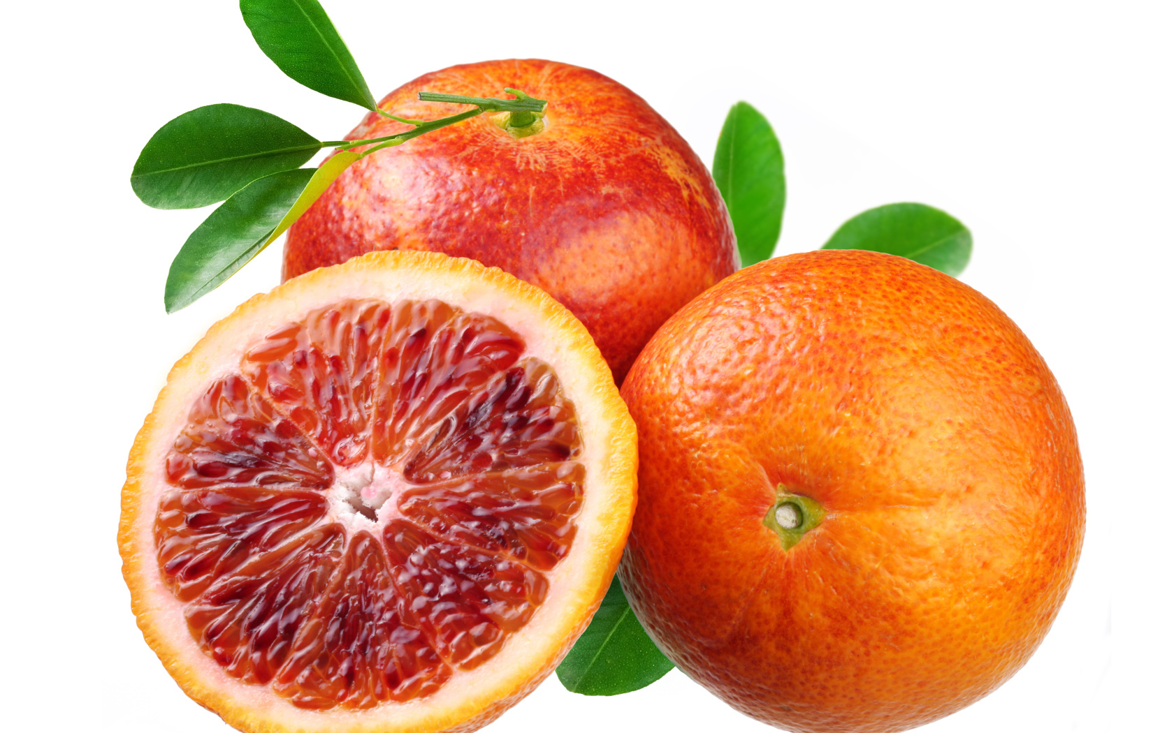 Красивые оранжевый грейпфруты на белом фоне