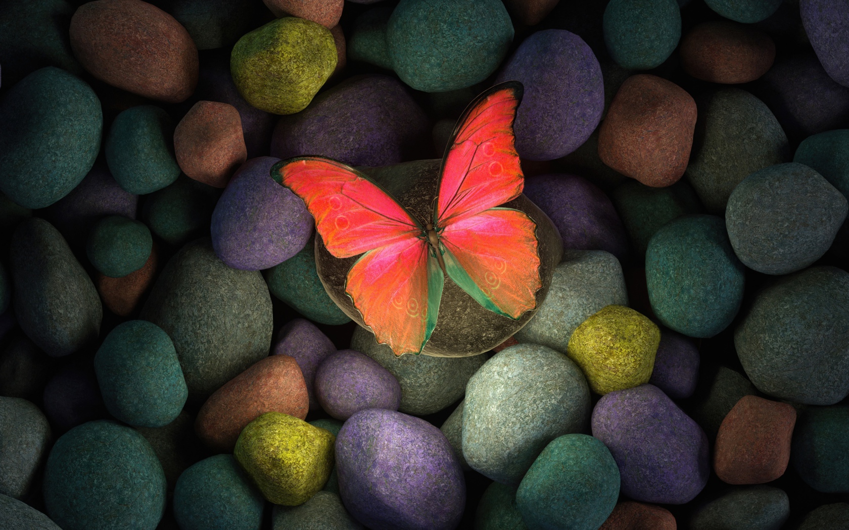 Бумажная бабочка на разноцветных камнях 
