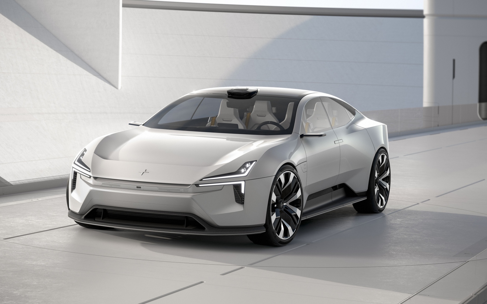 Серебристый автомобиль Polestar Precept 2020 года