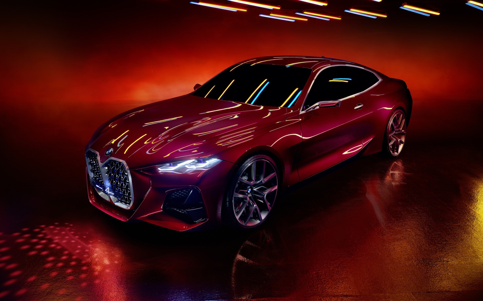 Красный автомобиль BMW Concept 4 2019 года на красном фоне