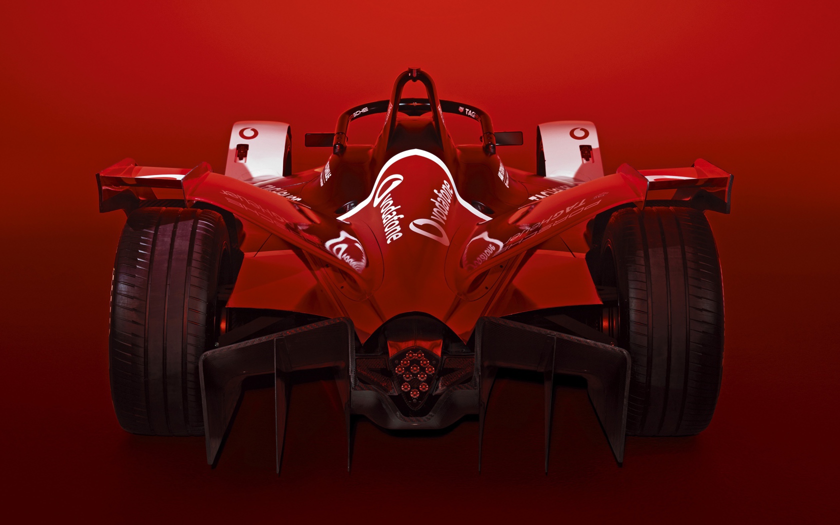 Красный гоночный автомобиль Porsche 99X Electric 2019 года 