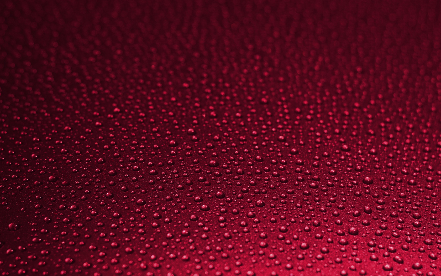 Красный фон с каплями воды 