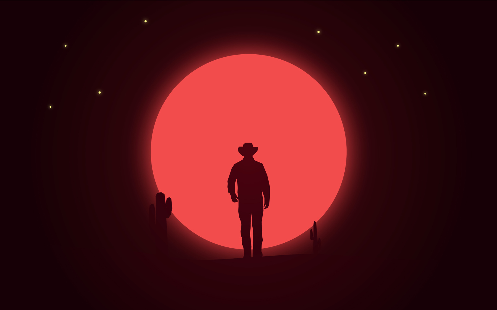 Силуэт ковбоя на фоне красной луны
