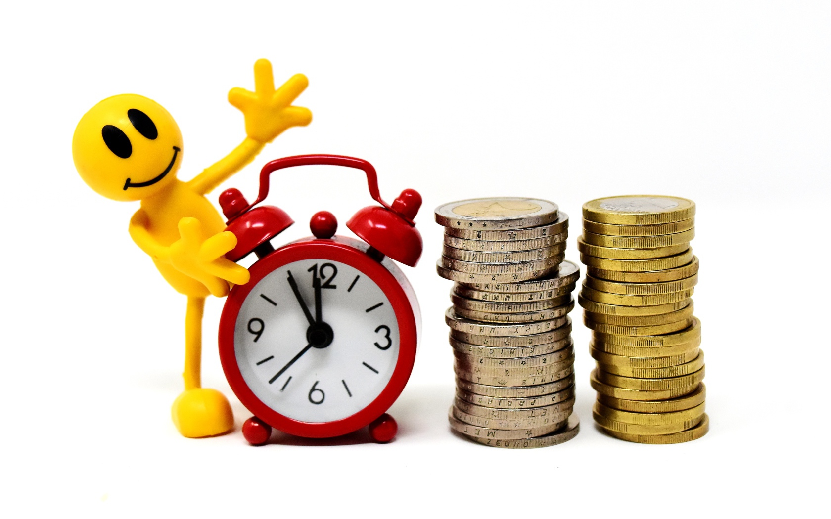 Yellow man with alarm clock and coins