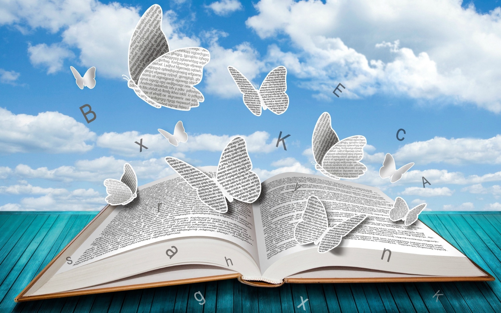 Бумажные бабочки и буквы над книгой 