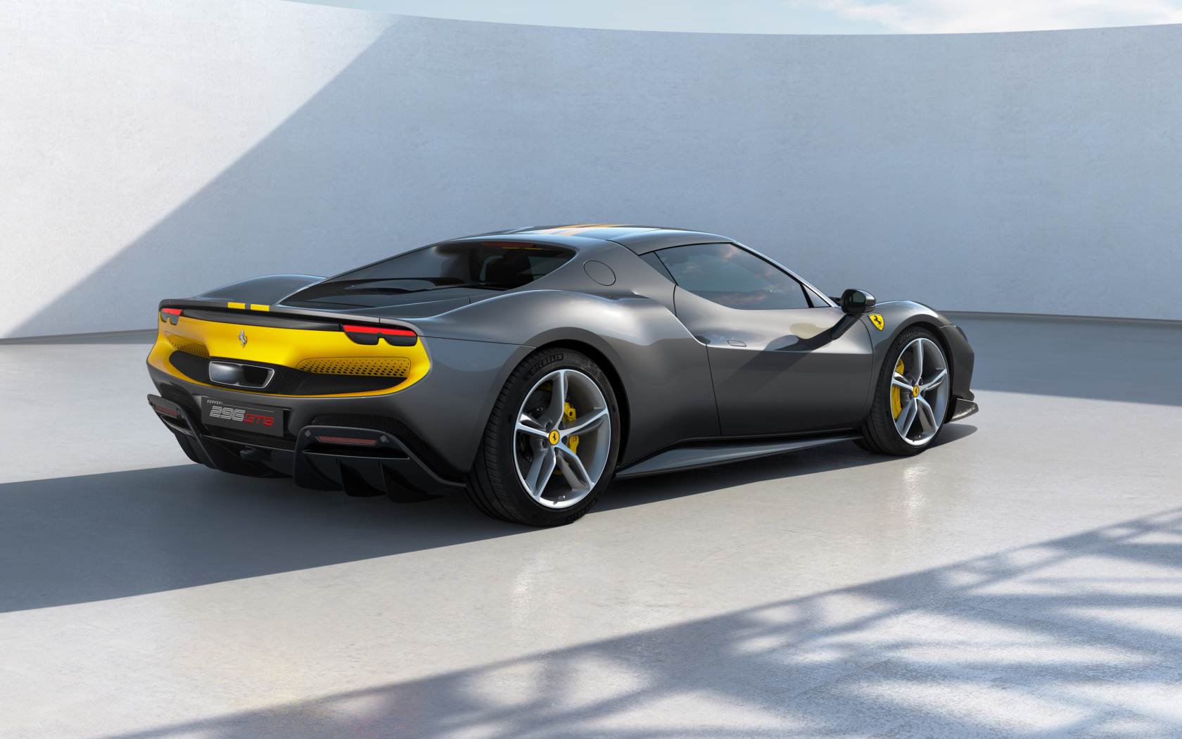 Быстрый автомобиль Ferrari 296 GTB Assetto Fiorano 2022  года вид сзади