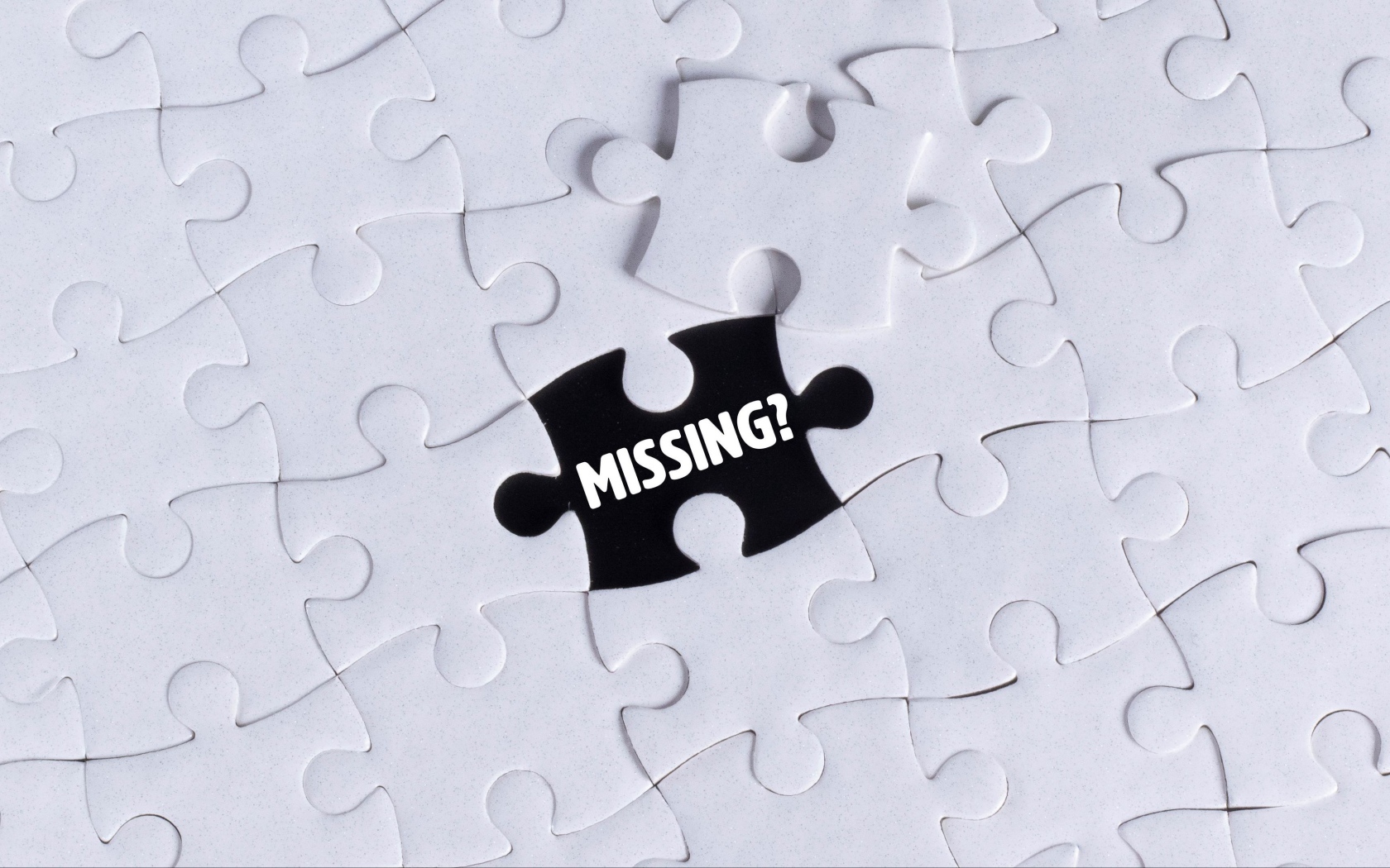 Черный пазл на белой картинке 