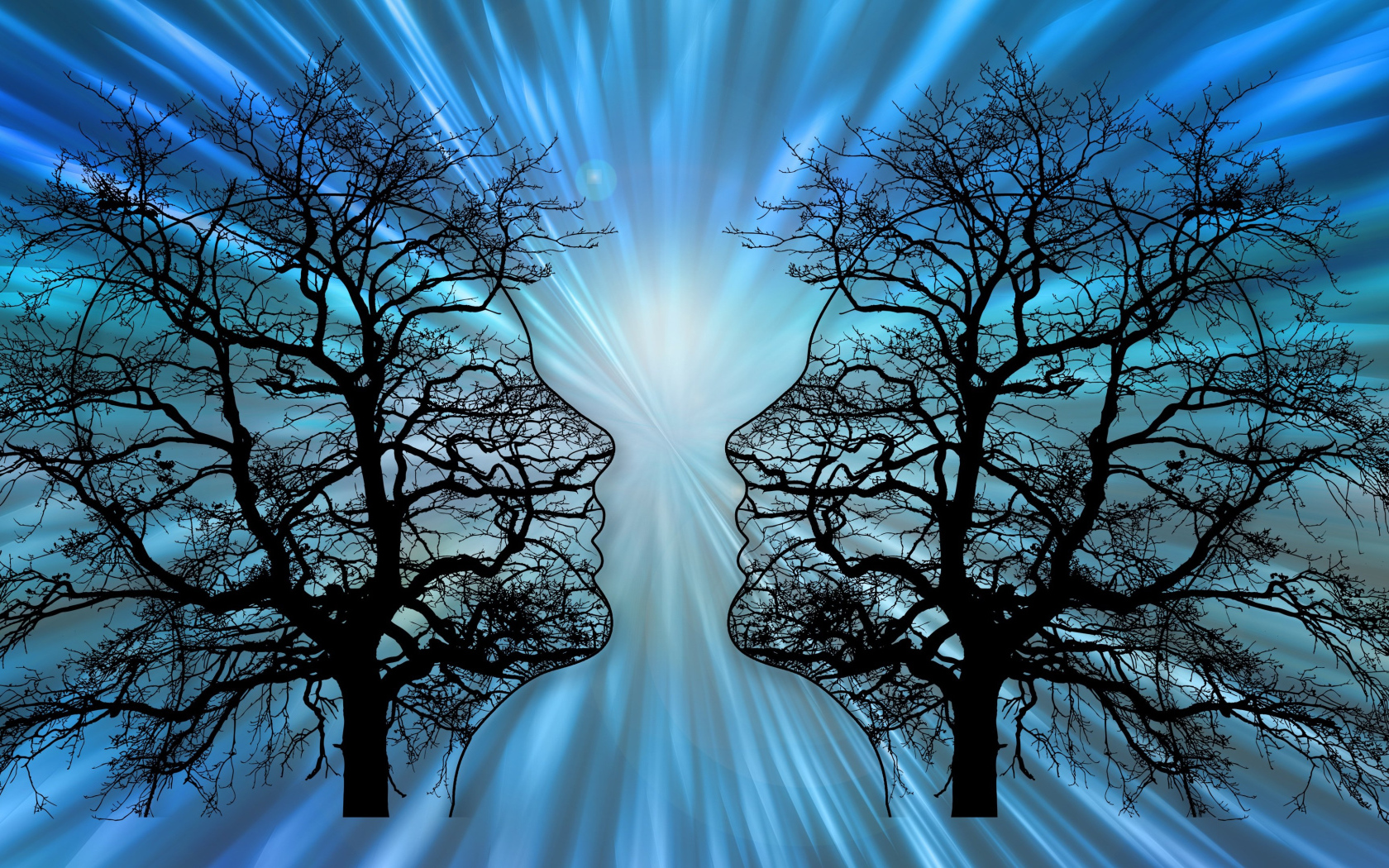 Два силуэта на опавших деревьях