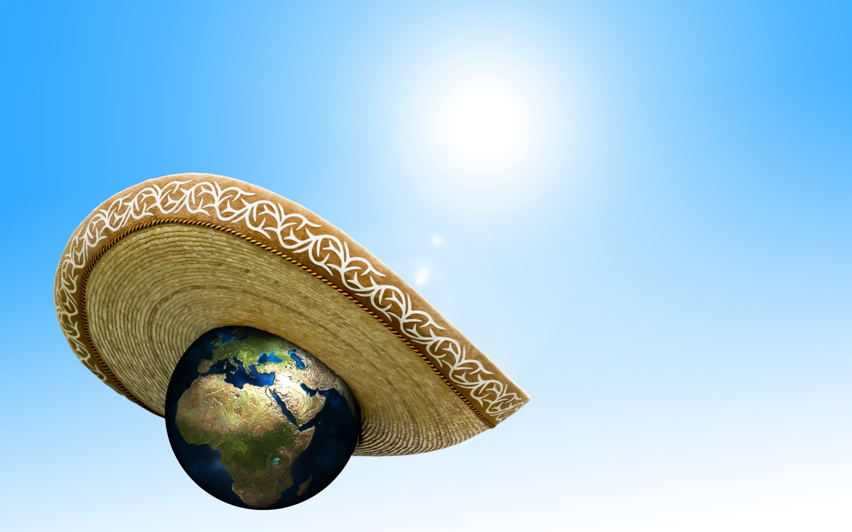 Планета земля в сомбреро на голубом фоне