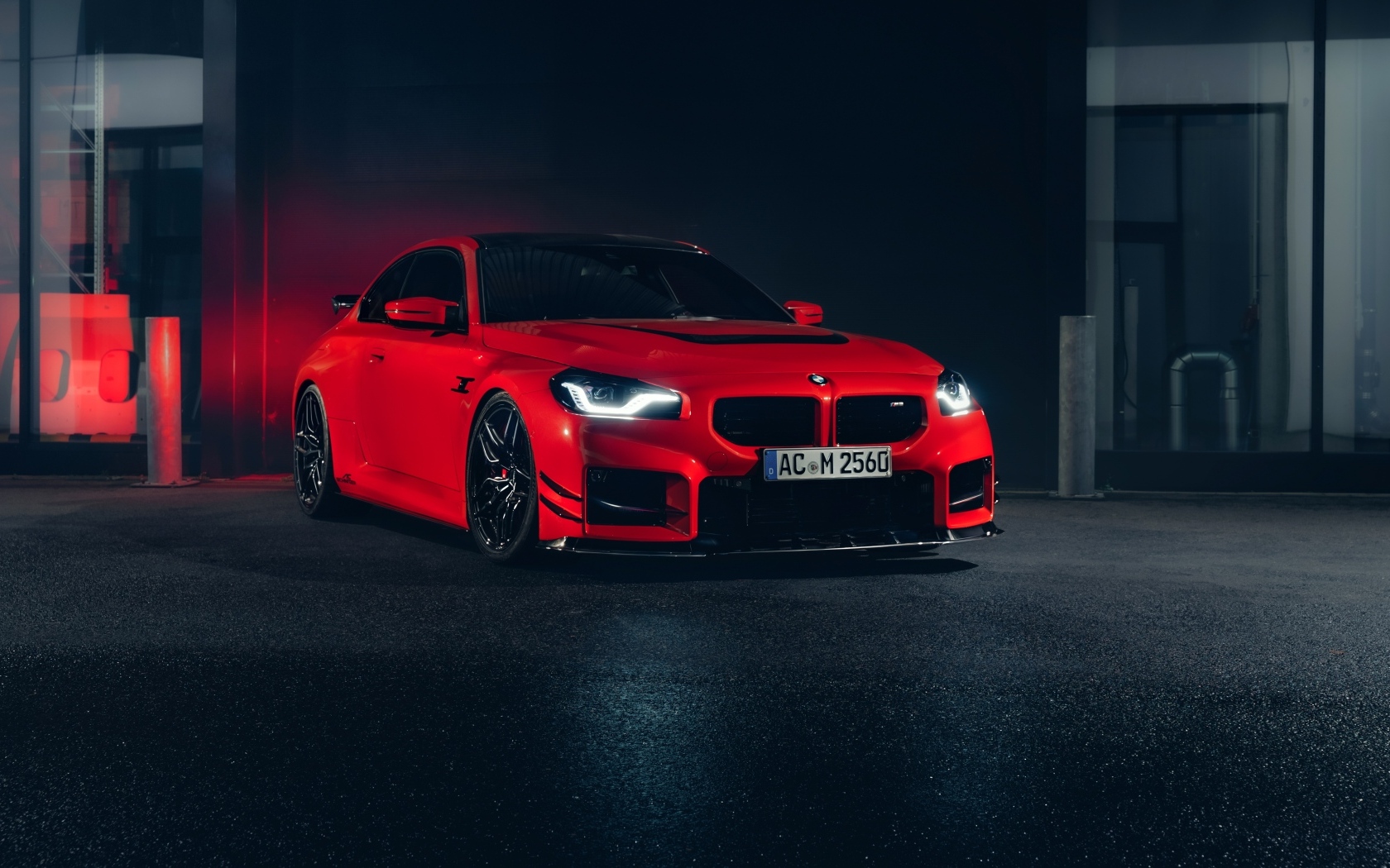 Красный автомобиль AC Schnitzer ACS2 Sport 2023 года