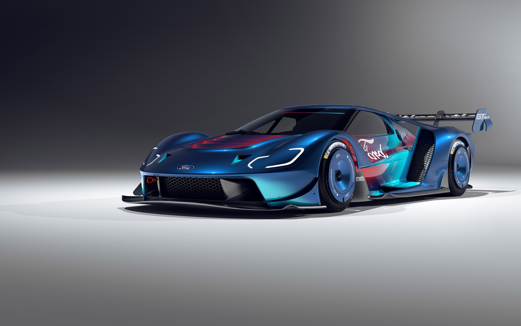 Автомобиль Ford GT Mk IV на сером фоне
