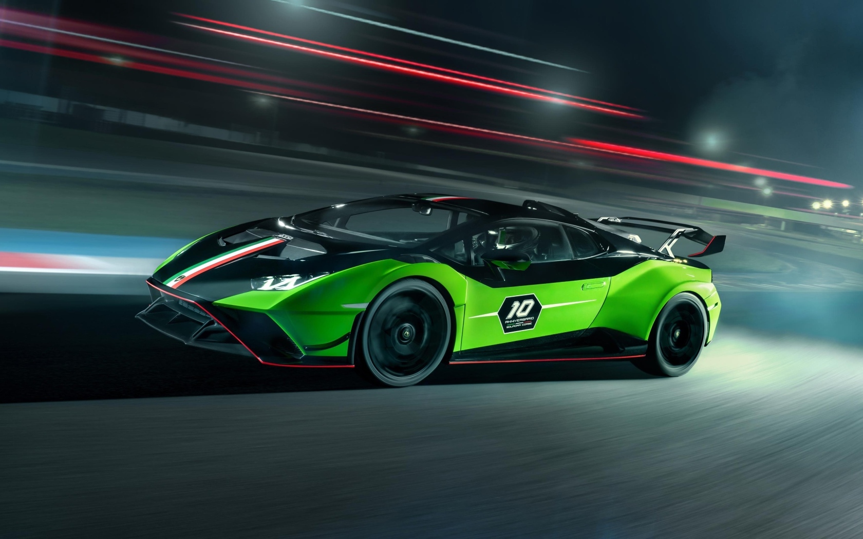 Зеленый быстрый автомобиль Lamborghini Huracan STO SC 10 Anniversario