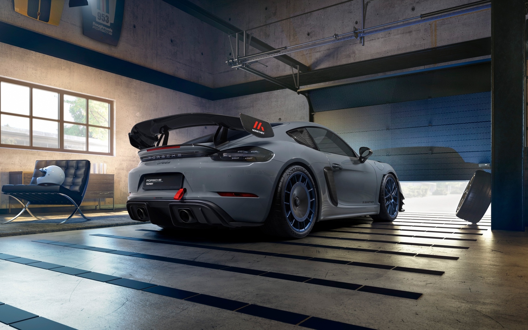 Вид сзади на автомобиль Porsche 718 Cayman GT4 RS Manthey Kit